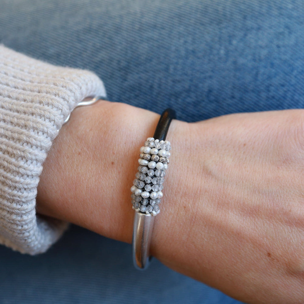 
                  
                    BRC-JM Hand Stitched White Zircon, Pearl & Hill Tribe Silver 1/2 Cuff Bracelet
                  
                