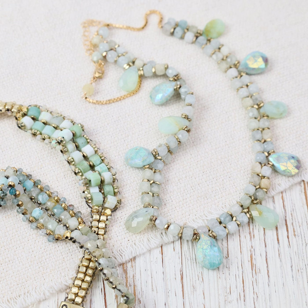 
                  
                    BRC-JM Hand Woven Soft Bracelet of Aqua Cubes on 5mm Bras
                  
                