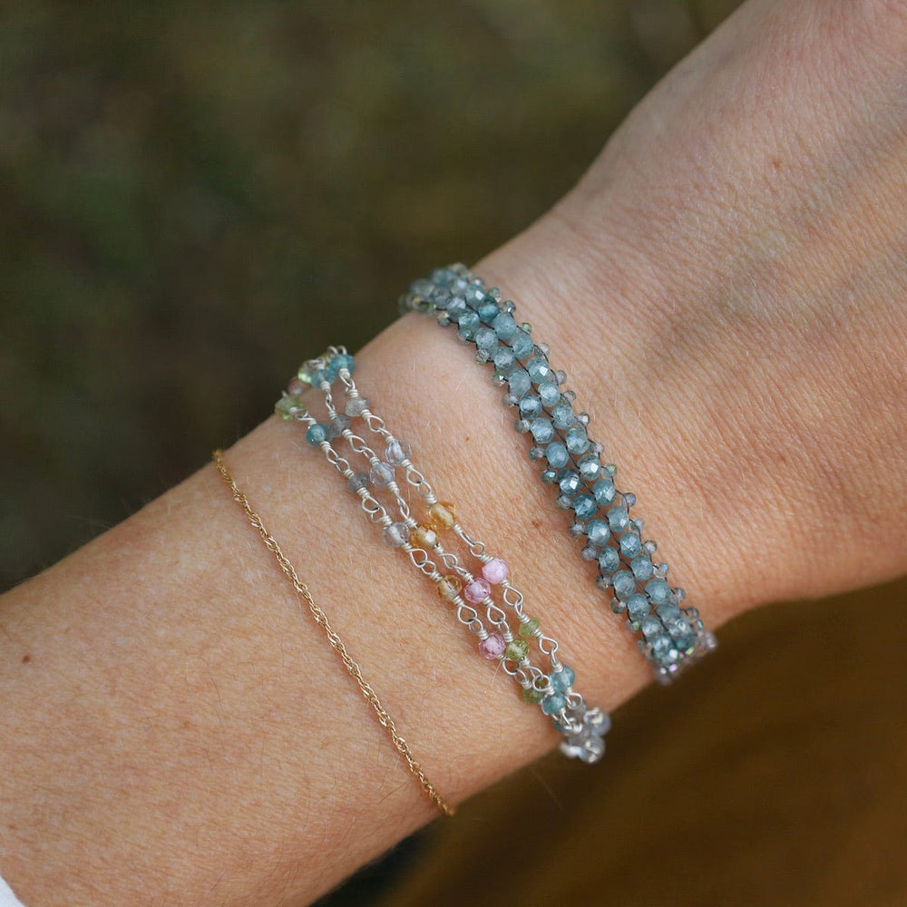 BRC-JM Hand Woven Soft Bracelet of Blue Topaz with Labradorite Trim