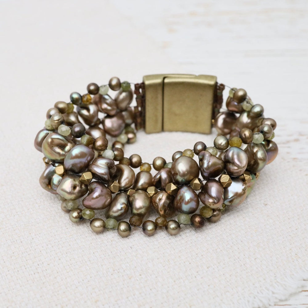 
                  
                    BRC-JM Hand Woven Soft Bracelet of Grey-Green Pearls
                  
                