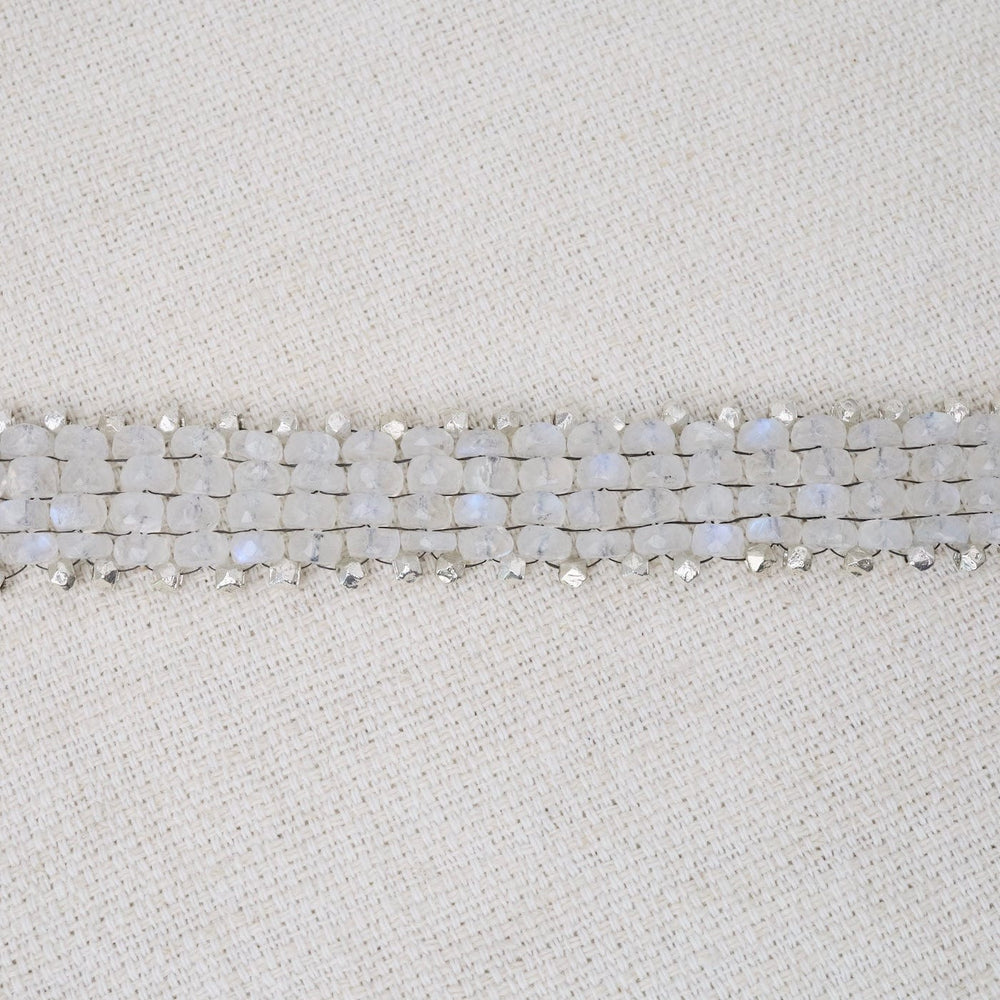 
                  
                    BRC-JM Hand Woven Soft Bracelet of Rainbow Moonstone with
                  
                