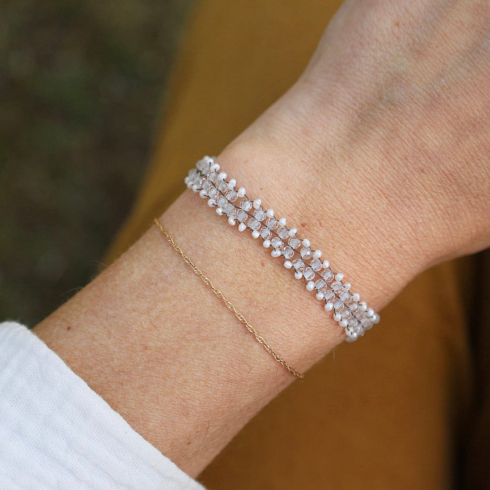 
                  
                    BRC-JM Hand Woven Soft Bracelet of White Topaz with Tiny Pearls
                  
                