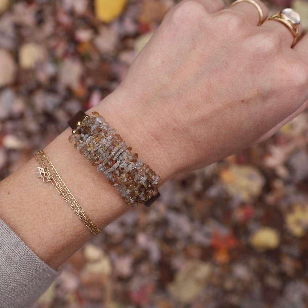 
                      
                        BRC-JM Imperial Topaz with Gold Pyrite Trim on Metallic Brown Leather Bracelet
                      
                    