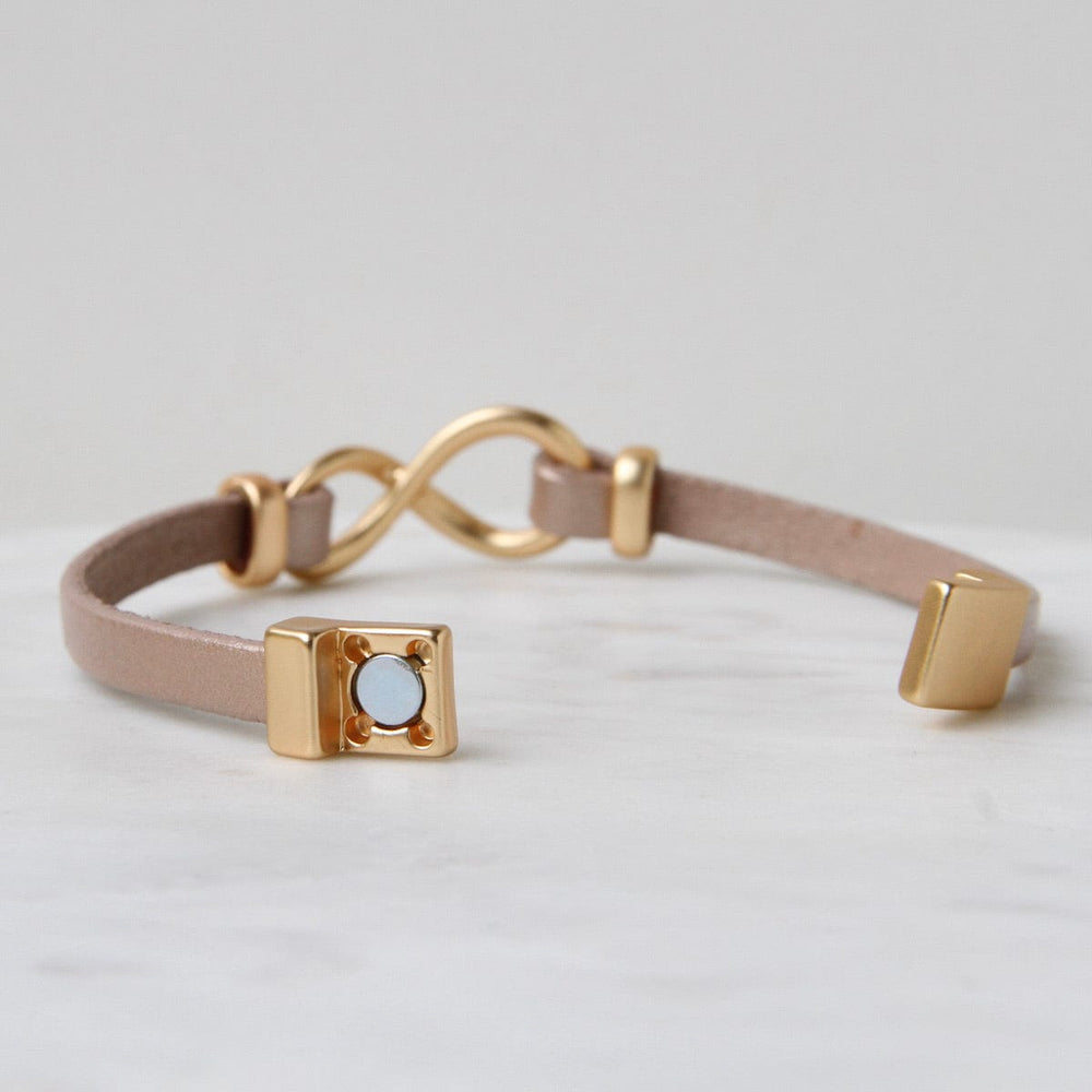 
                  
                    BRC-JM Matte Gold Champagne Infinity Bracelet
                  
                