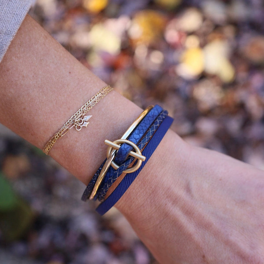 
                  
                    BRC-JM Matte Gold Cirlce Bar Blue Bracelet
                  
                