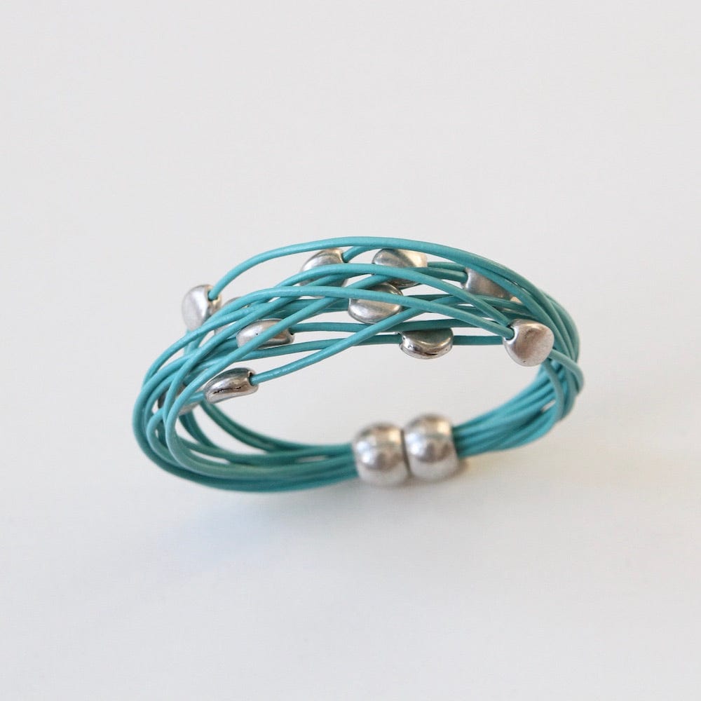 
                  
                    BRC-JM MULTI PEBBLE SILVER/ TURQUOISE MAGNETIC BRACELET
                  
                