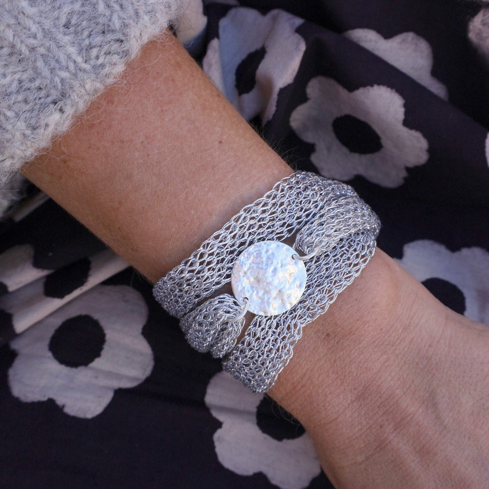 
                      
                        BRC-JM Silver Mesh Coin Bracelet
                      
                    