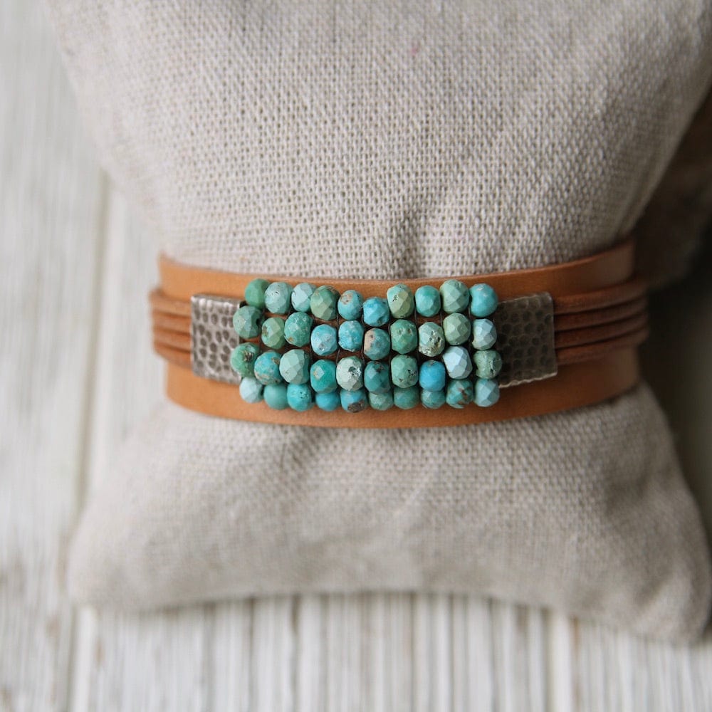 
                  
                    BRC-JM Turquoise with Hill Tribe Sliders Hand Stitched Leather Cuff
                  
                