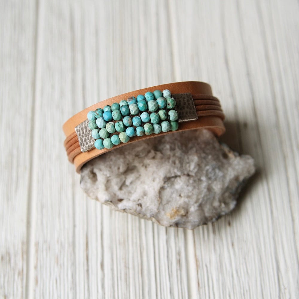 
                  
                    BRC-JM Turquoise with Hill Tribe Sliders Hand Stitched Leather Cuff
                  
                