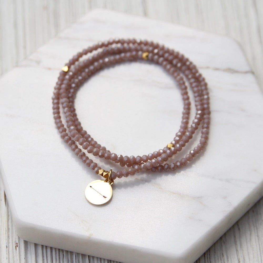 
                      
                        BRC Keep Aiming ~ Stretchy Nude Crystal Wrap Bracelet
                      
                    