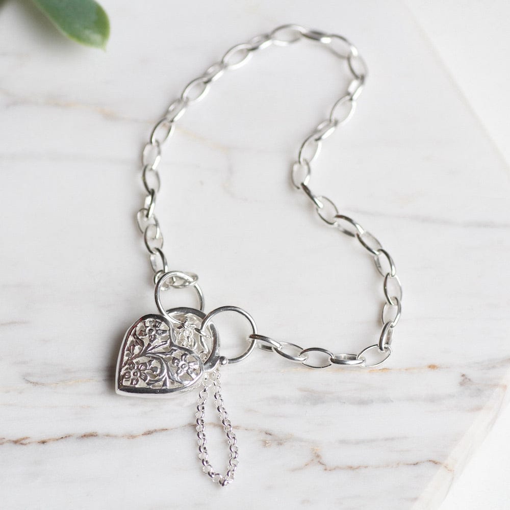 
                  
                    BRC Link Chain Bracelet with Filagree Heart Lock
                  
                