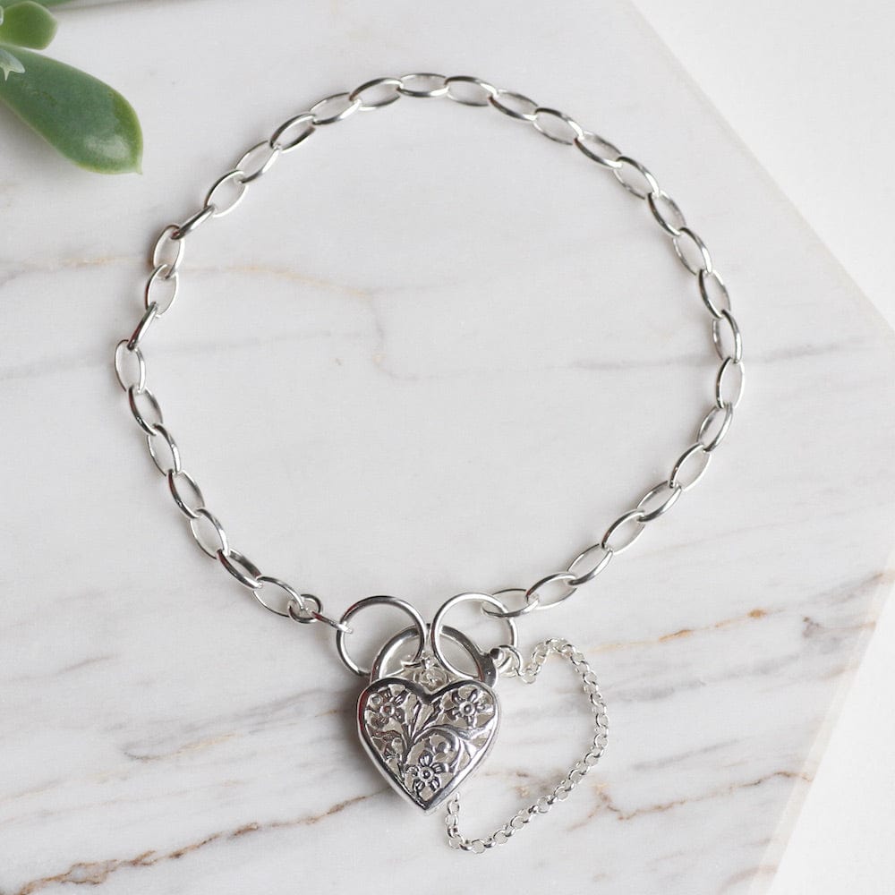 
                  
                    BRC Link Chain Bracelet with Filagree Heart Lock
                  
                