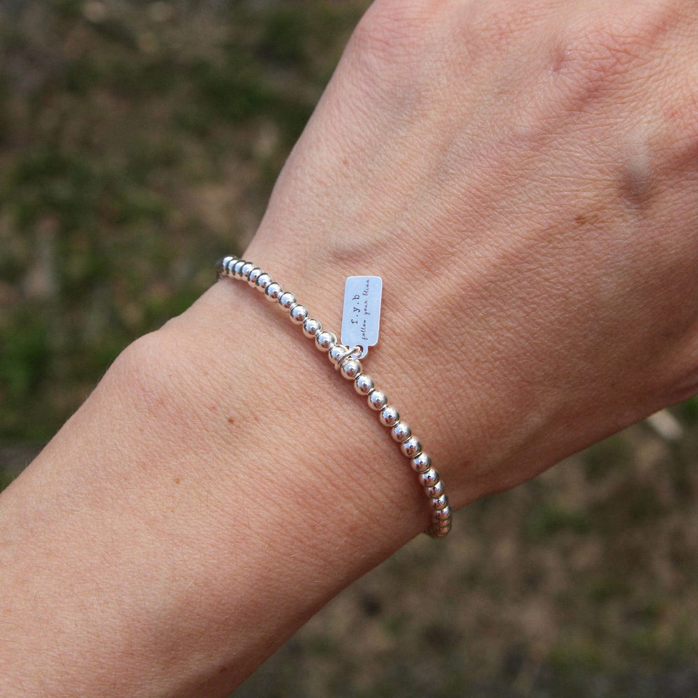 
                      
                        BRC Mini Silver Staple Bracelet
                      
                    