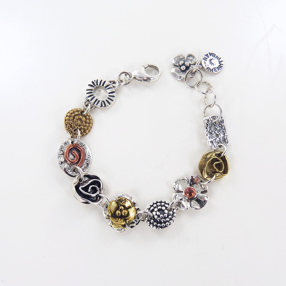 
                      
                        BRC MIXED METAL CHARM BRACELET
                      
                    