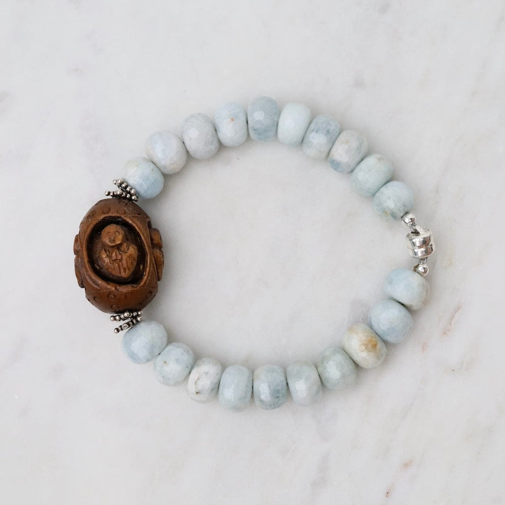 
                      
                        BRC One of a Kind Blue Quartz Bracelet with Carved Woo
                      
                    