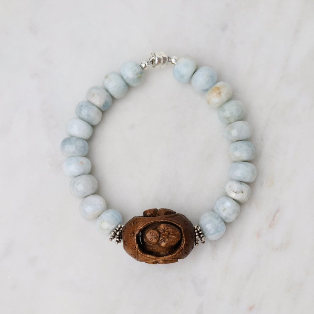 
                      
                        BRC One of a Kind Blue Quartz Bracelet with Carved Woo
                      
                    