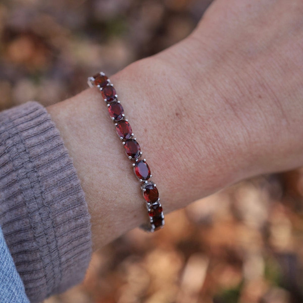 BRC Oval Garnet Tennis Bracelet