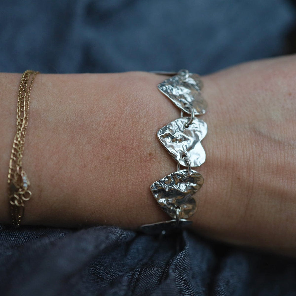 
                      
                        BRC Reticulated Heart Bracelet
                      
                    