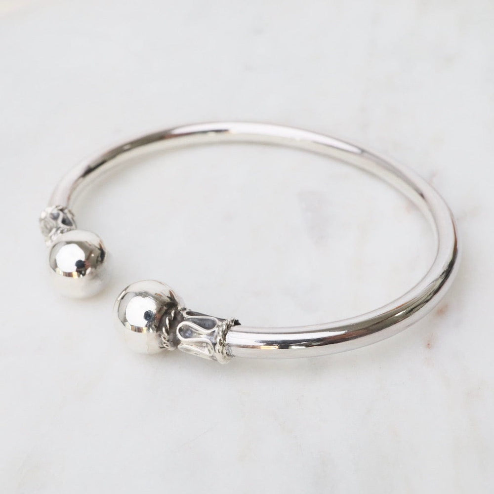 
                  
                    BRC Round Tube with Ball Ends Sterling Silver Cuff
                  
                