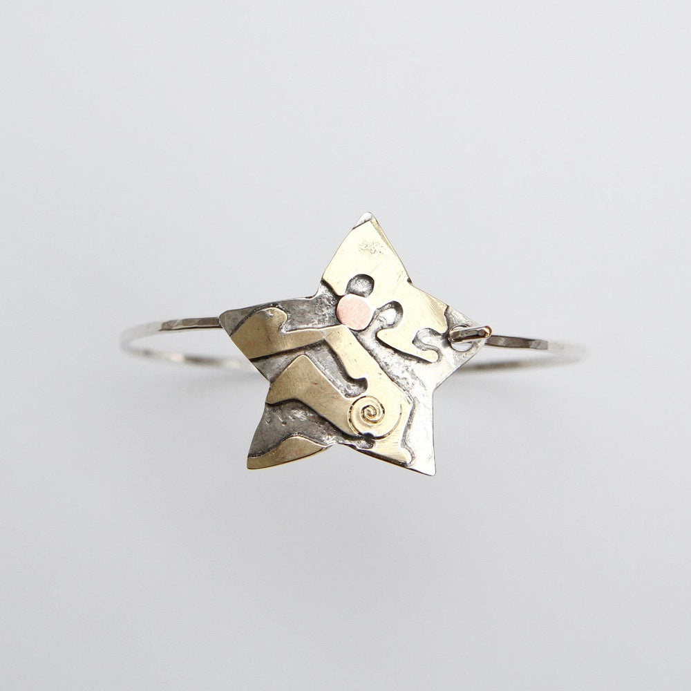 
                  
                    BRC Silver Star with Abstract Brass Cutouts Latching Bracelet
                  
                