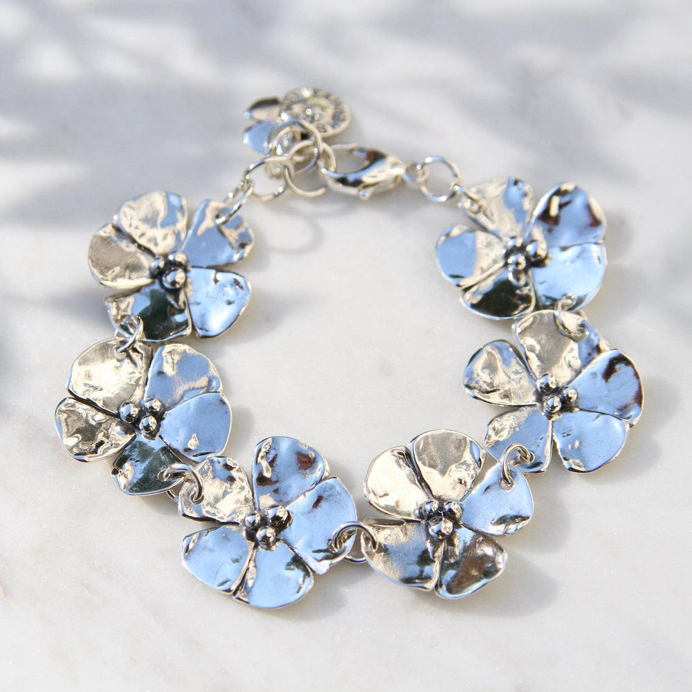 
                      
                        BRC Six Dogwood Flower Bracelet
                      
                    