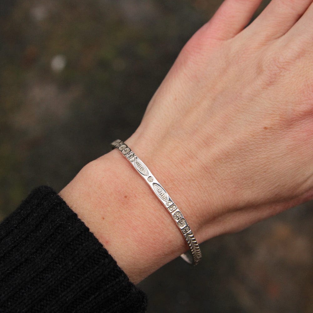 
                      
                        BRC Stamped Fish and Fern Bangle
                      
                    