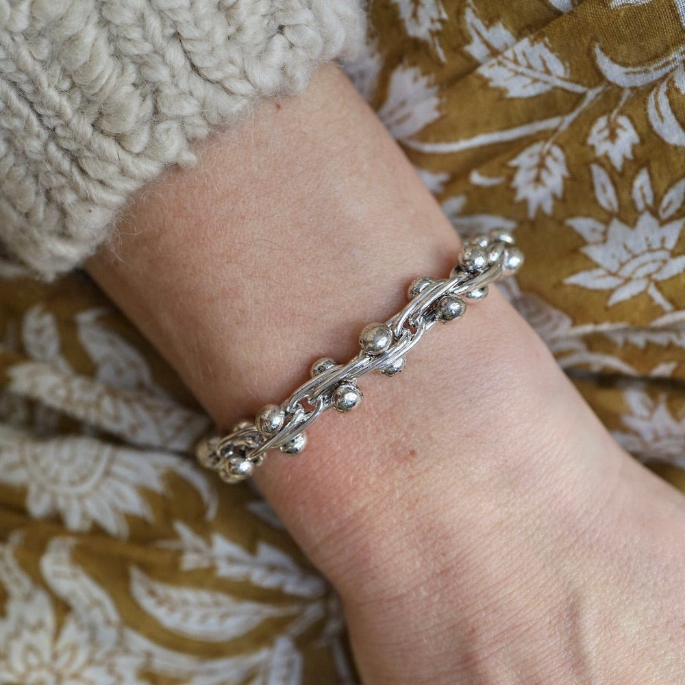 
                      
                        BRC Sterling Silver Barbell Chain Bracelet
                      
                    