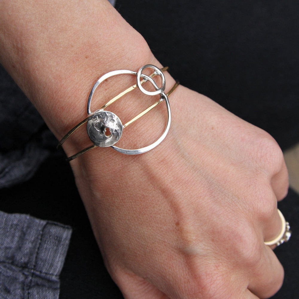 
                  
                    BRC Sterling Silver & Brass Circles Bracelet
                  
                