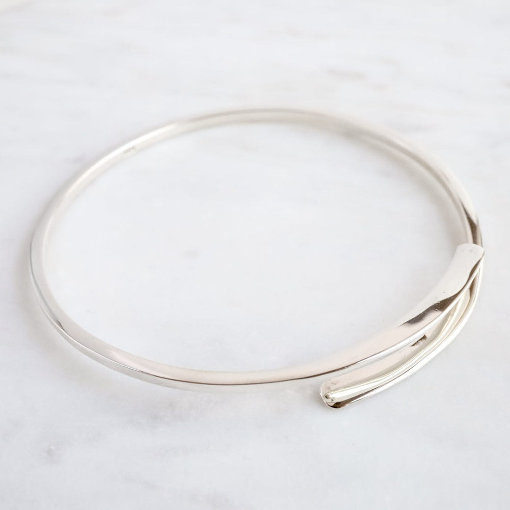 
                  
                    BRC Sterling Silver Coil Bangle Bracelet
                  
                