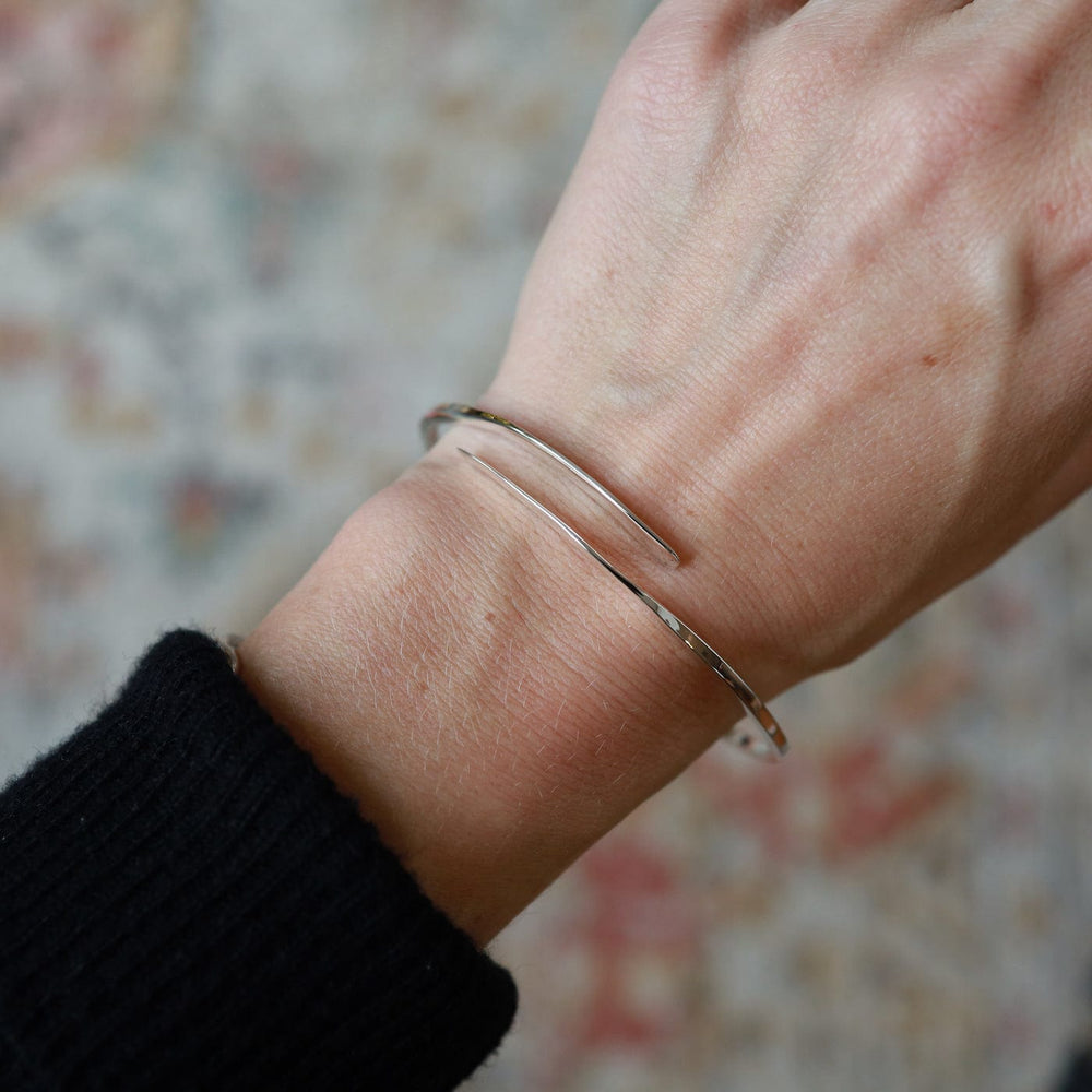 
                  
                    BRC Sterling Silver Coil Bangle Bracelet
                  
                