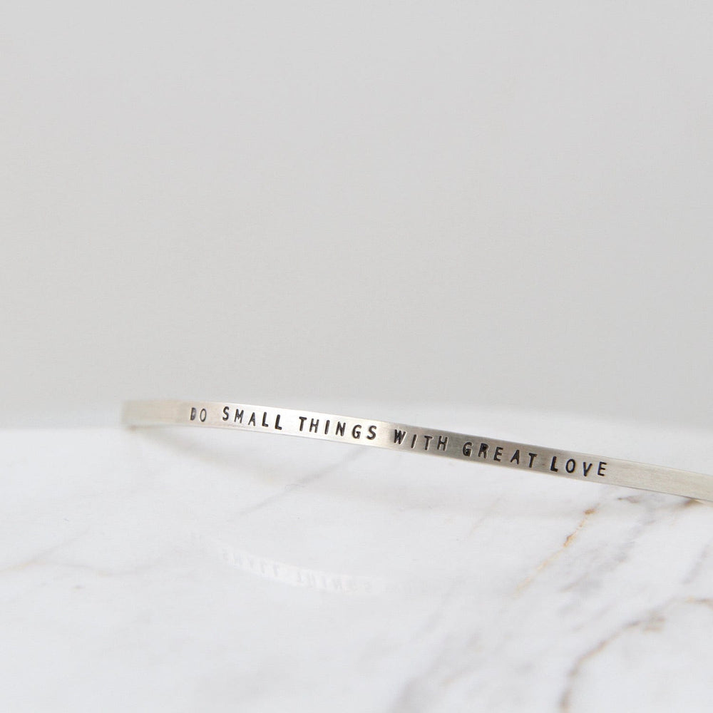 
                  
                    BRC Sterling Silver Cuff - "Do Small Things with Great Love"
                  
                