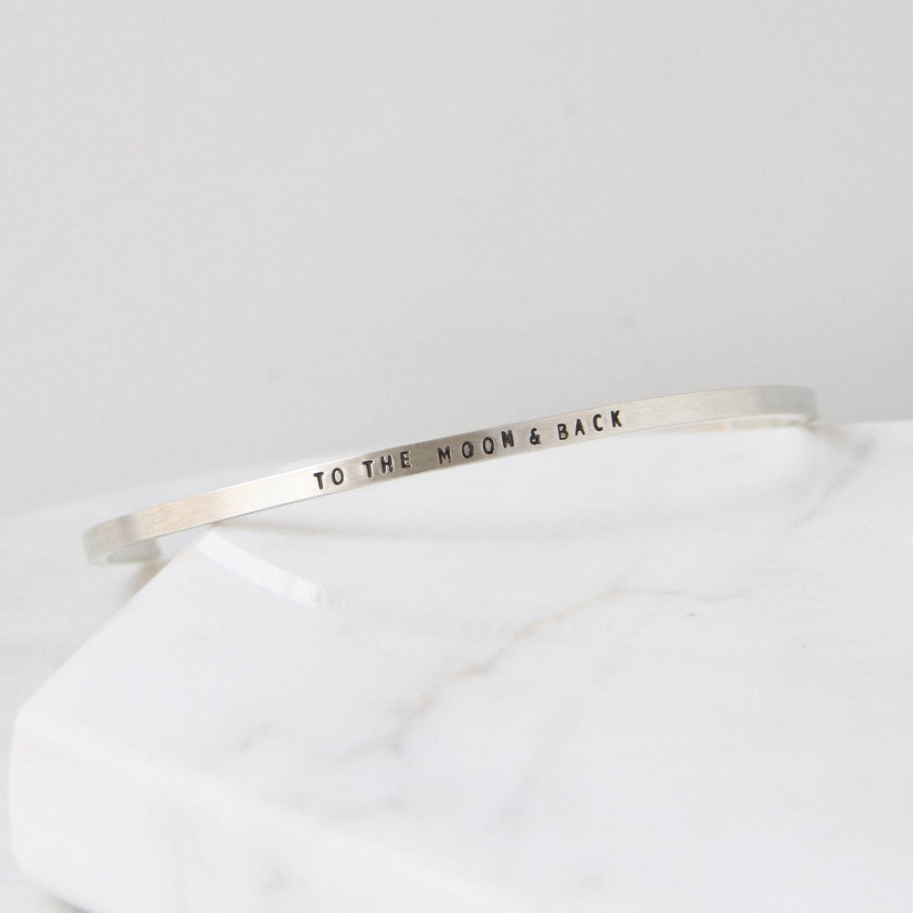 
                      
                        BRC Sterling Silver Cuff - "To The Moon & Back"
                      
                    