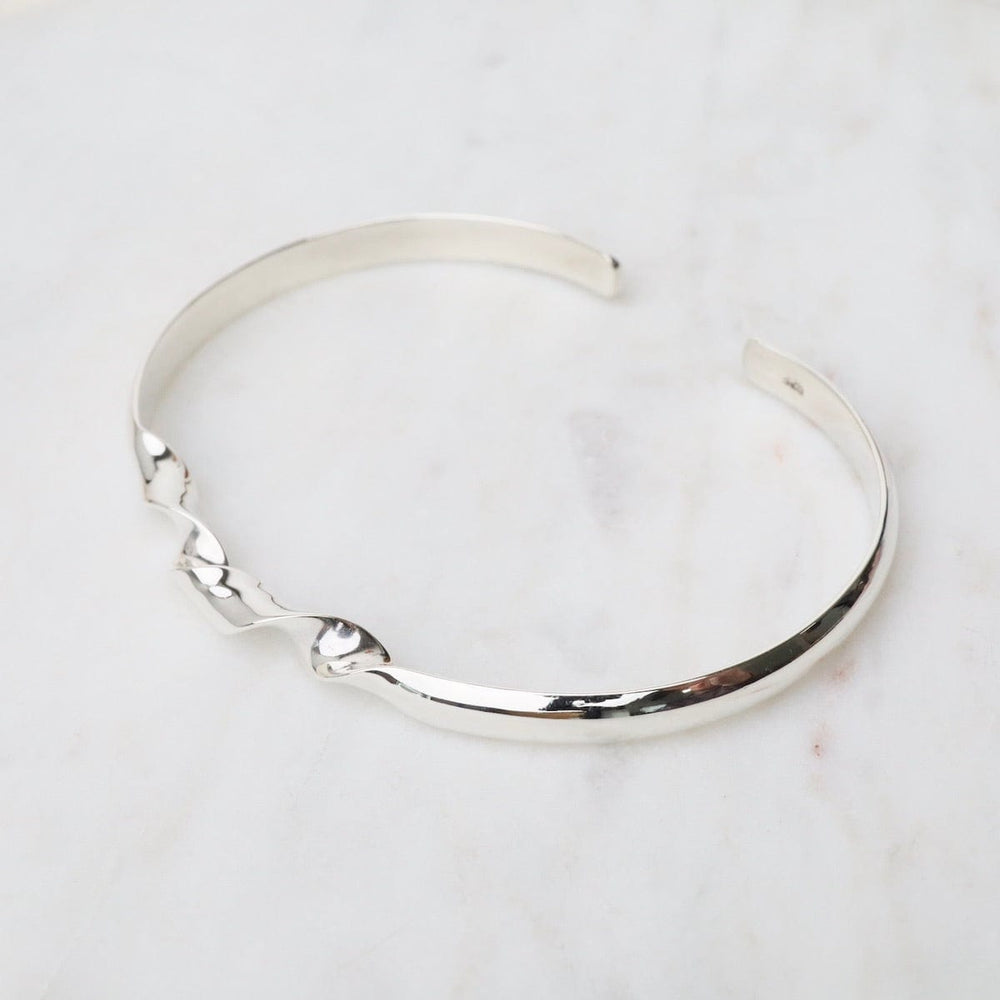 
                  
                    BRC Sterling Silver Cuff with Twisted Ribbon Front
                  
                