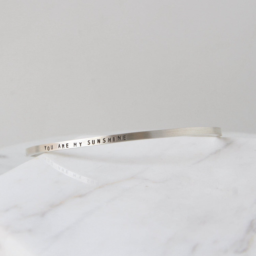 
                  
                    BRC Sterling Silver Cuff - "You Are My Sunshine"
                  
                