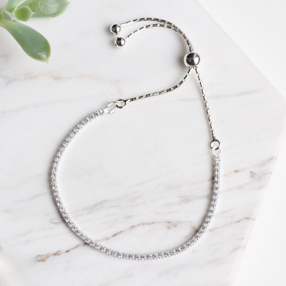 
                  
                    BRC Sterling Silver CZ Bracelet with Sliding Bead Closure
                  
                