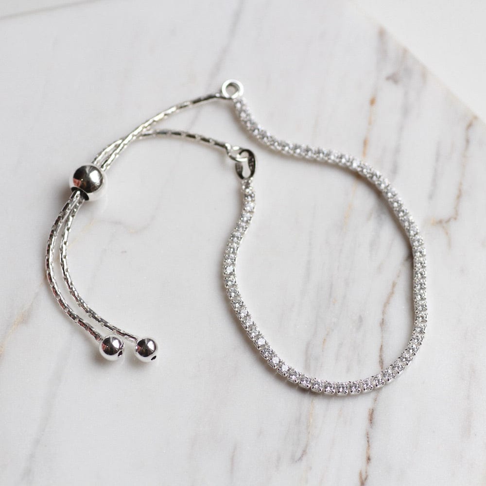 
                  
                    BRC Sterling Silver CZ Bracelet with Sliding Bead Closure
                  
                