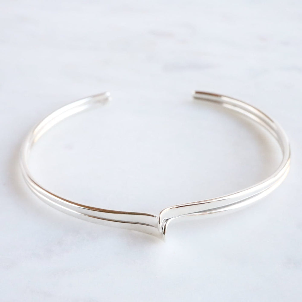 
                  
                    BRC Sterling Silver Double Wave Cuff Bracelet
                  
                