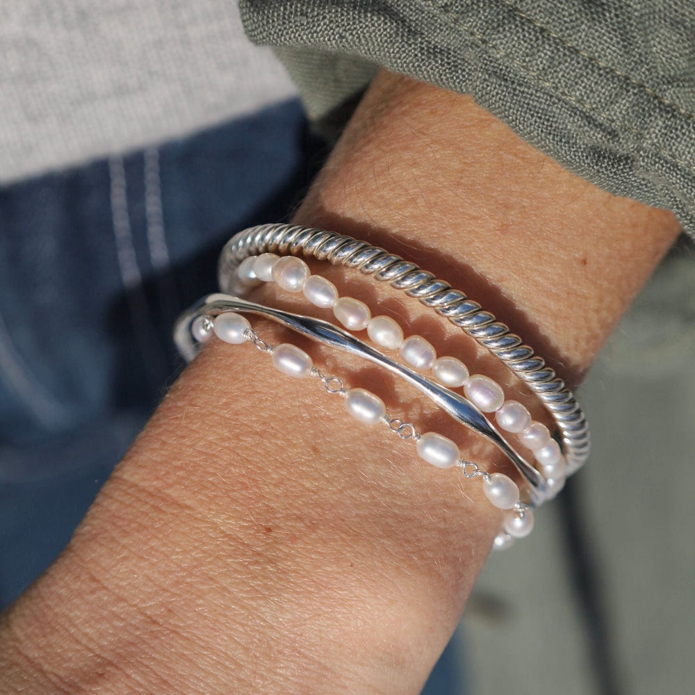 
                  
                    BRC Sterling Silver Heavy Twisted Cuff with Curled Ends
                  
                