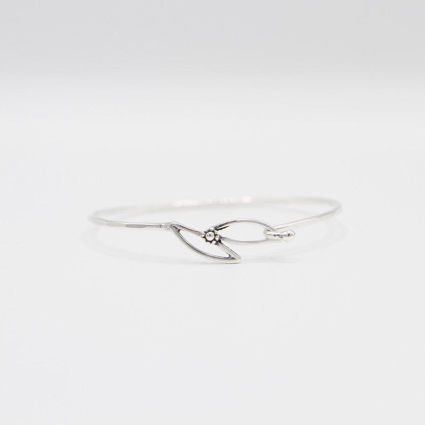 
                      
                        BRC Sterling Silver Hook Bangle with Double Leaf
                      
                    