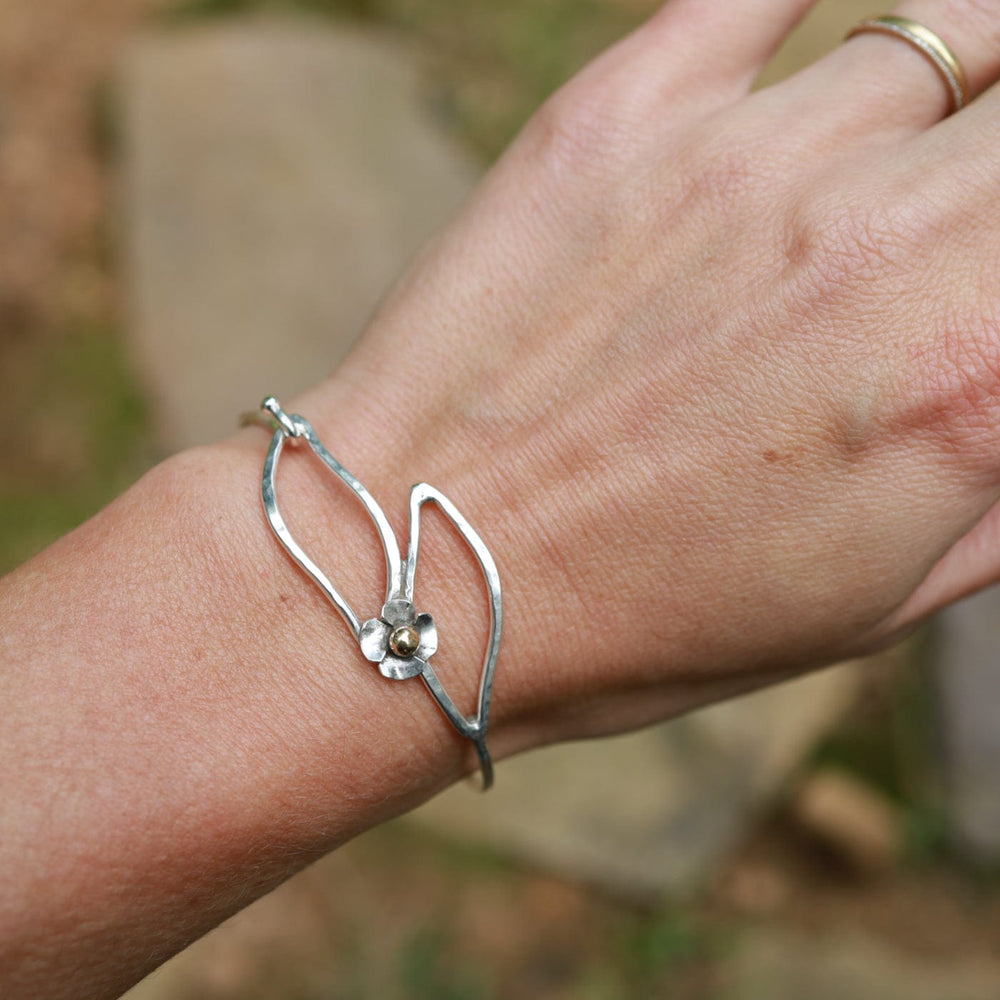 
                  
                    BRC Sterling Silver Hook Bangle with Double Leaf
                  
                