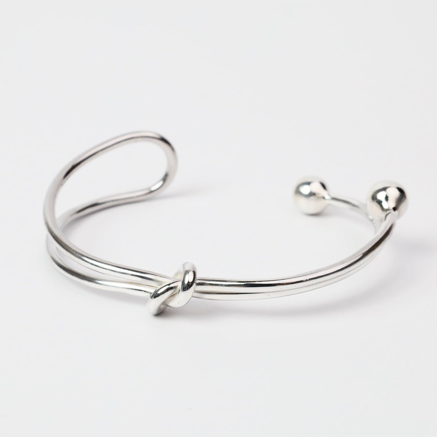 BRC Sterling Silver Looped Slip Knot with Uneven Ball Ends Cuff Bracelet
