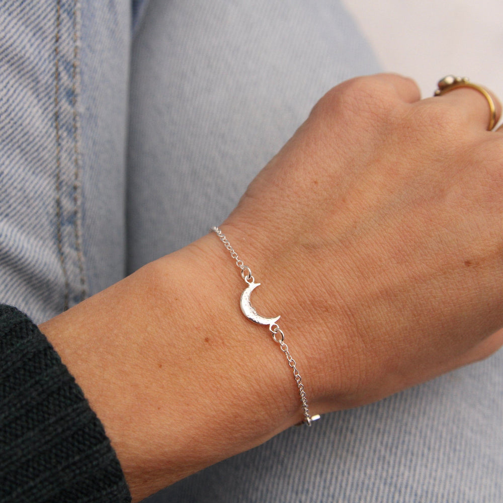 
                      
                        BRC Sterling Silver Moon & Star Bracelet
                      
                    