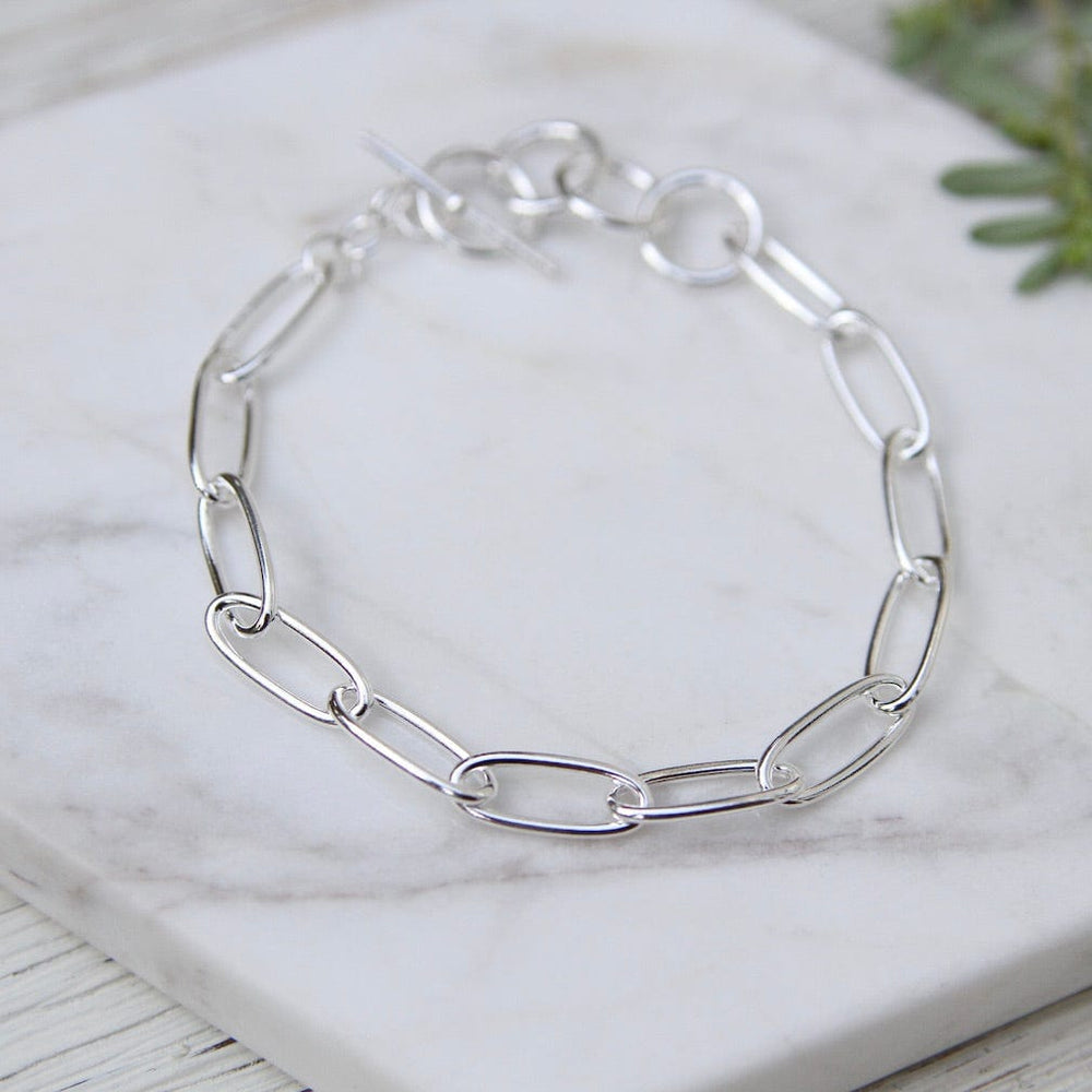 
                      
                        BRC Sterling Silver Oval Link Chain Bracelet
                      
                    