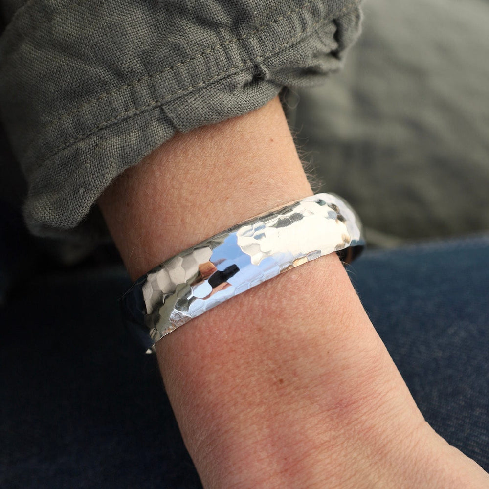 
                  
                    BRC Sterling Silver Rounded Hammered Dome Cuff
                  
                