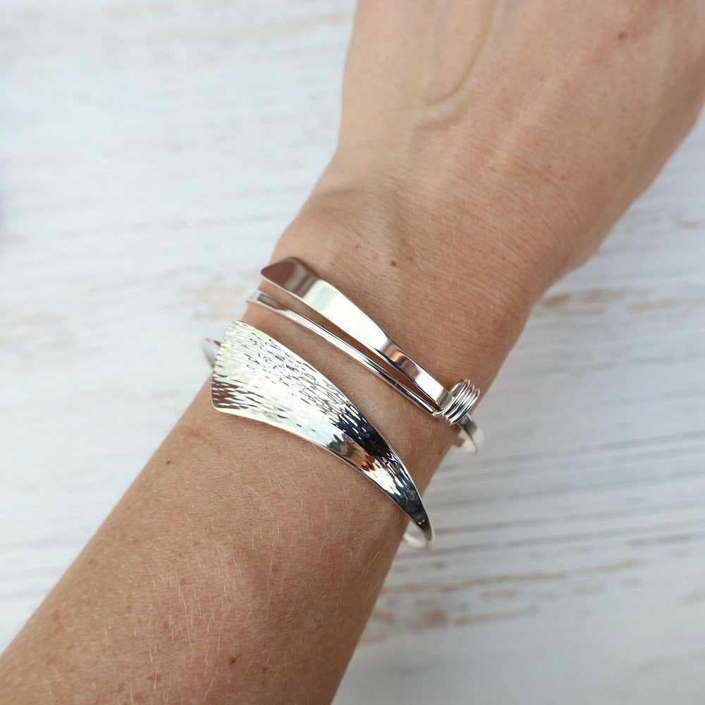 
                      
                        BRC Sterling Silver Slide Bracelet
                      
                    