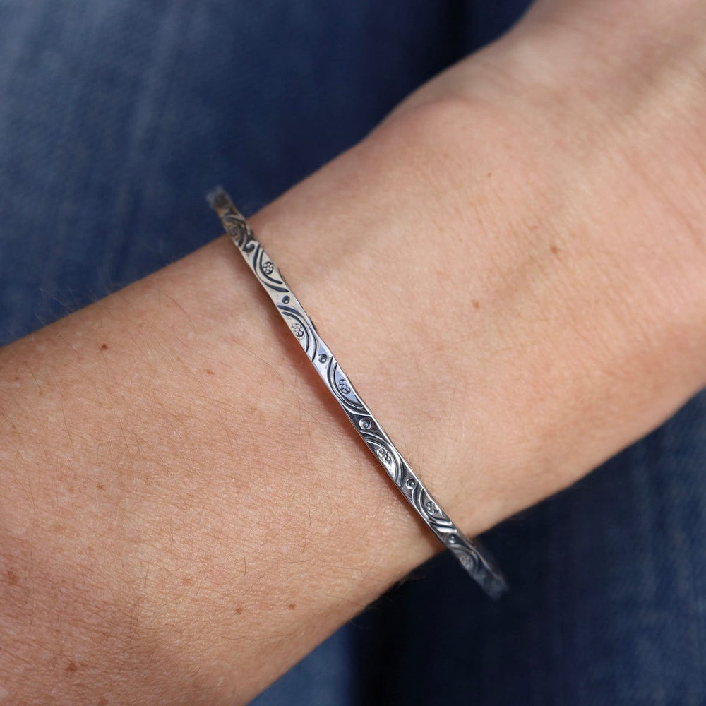 
                  
                    BRC Sterling Silver Square Cuff with Stamped Half Circle Pattern
                  
                