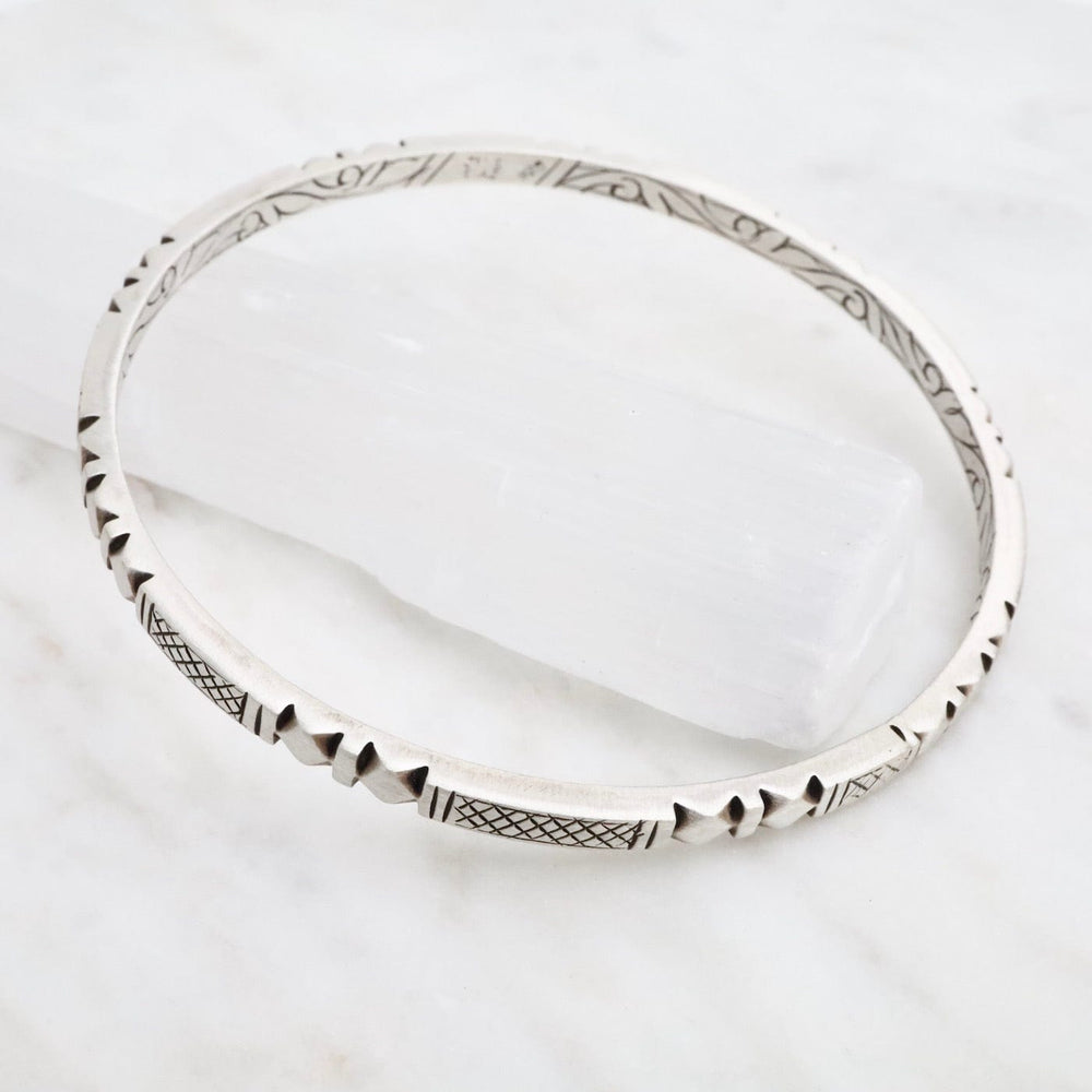 
                      
                        BRC Sterling Silver Traditional Nepali Carved Bangle
                      
                    