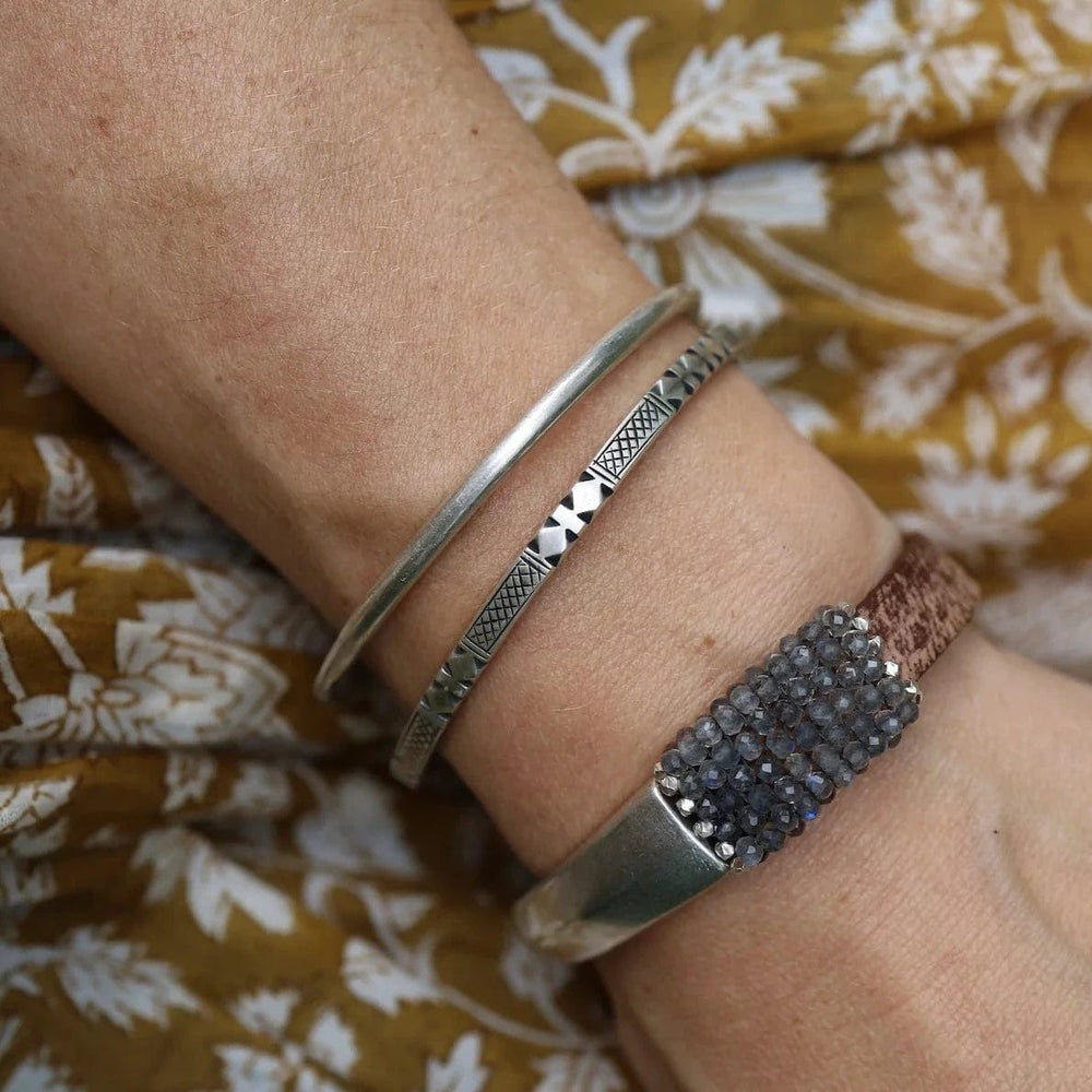 
                      
                        BRC Sterling Silver Traditional Nepali Carved Bangle
                      
                    