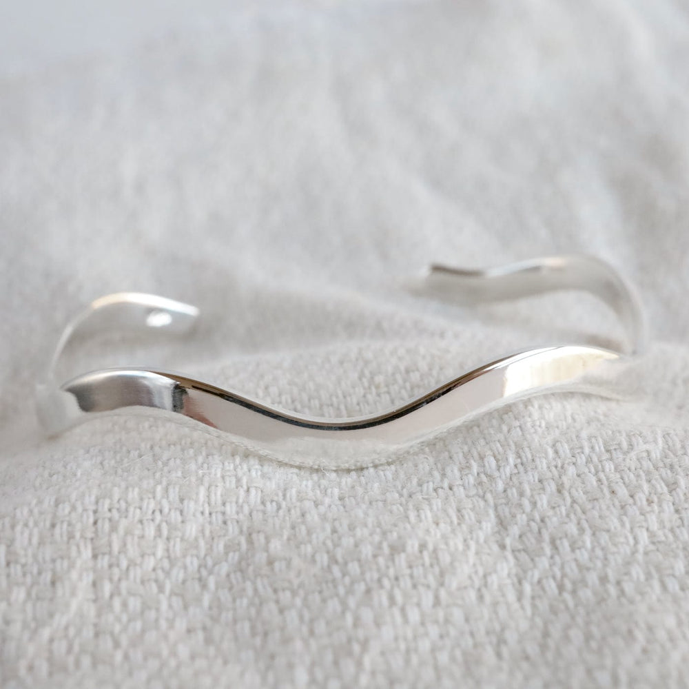 
                      
                        BRC Sterling Silver Wavy Line Cuff Bracelet
                      
                    