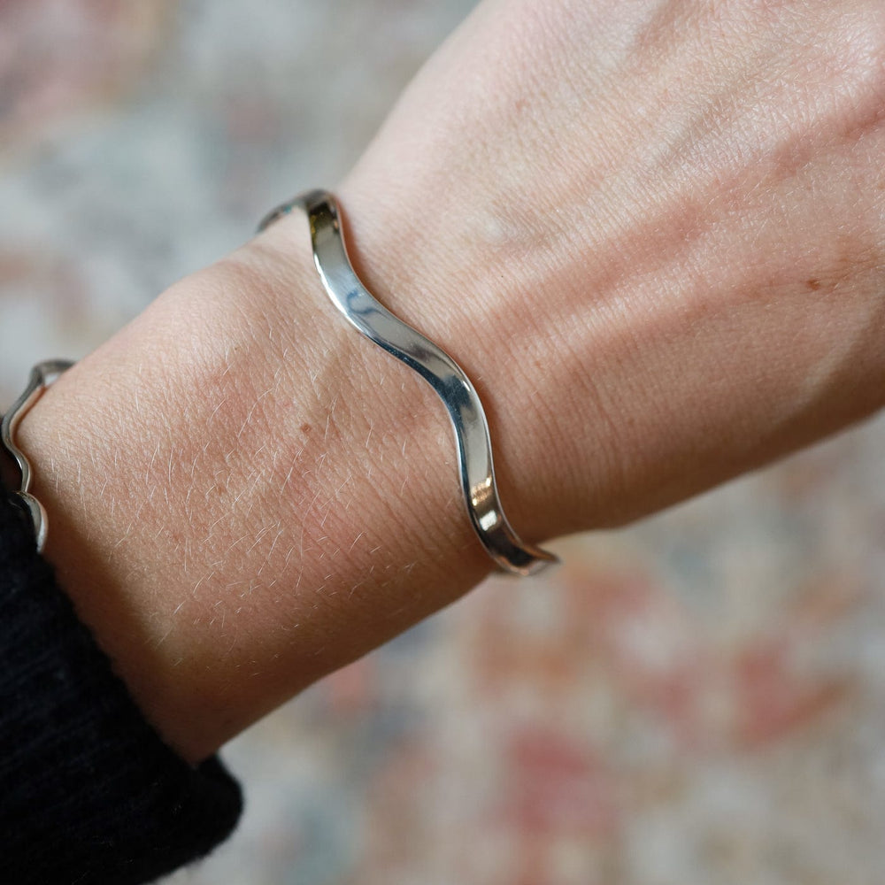 
                      
                        BRC Sterling Silver Wavy Line Cuff Bracelet
                      
                    